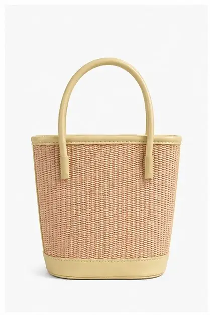 Borsa cestina piccola in tessuto fine con base rifinita in pelle