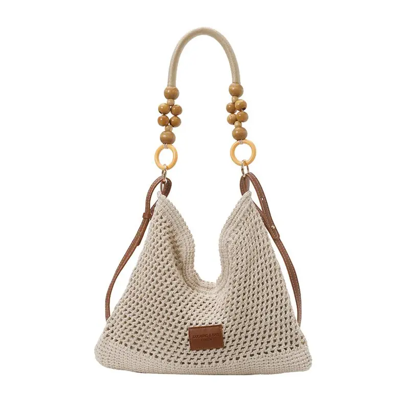 Bolso tote tejido a mano en mezcla de paja con tejido abierto — bolso tejido a mano de WEFTAVA